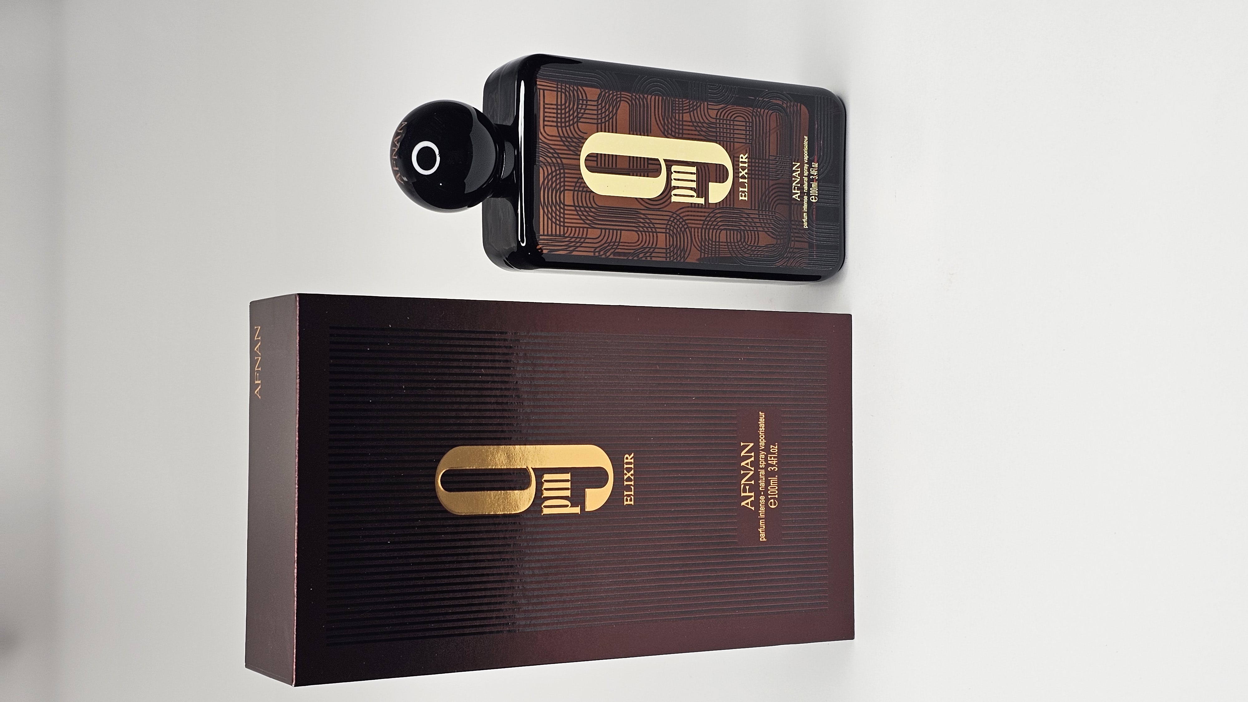 عطر ادکلن افنان مدل 9 پی ام الکسیر رایحه ژان پل گوتیه له میل الکسیر ابسولو 100میل