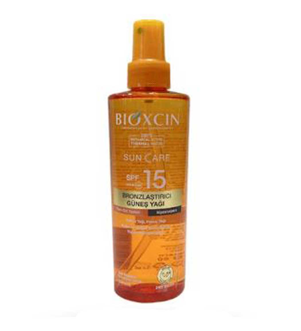 اسپری روغن برنز کننده دارای spf15 حجم 200 میل بیوکسین